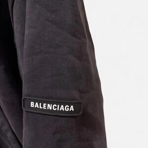 Balenciaga Men’s hooded bomber in black fade